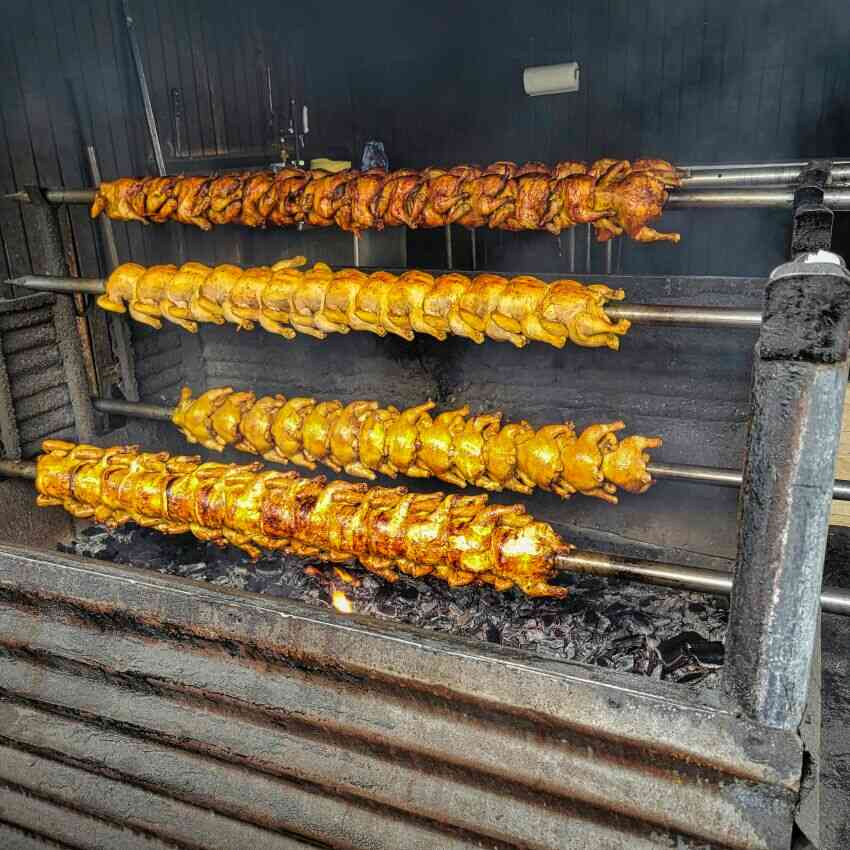 Rotisserie Chicken cooking at La Reine Chicken Shack St Croix US Virgin Islands 