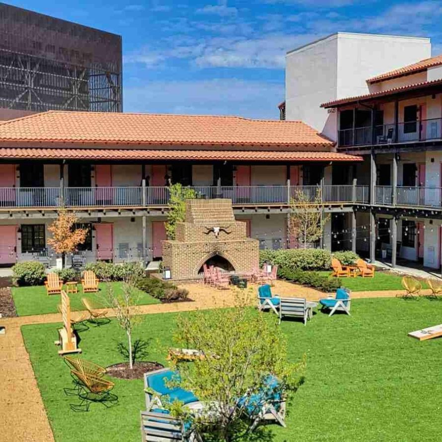 Outdoor courtyard Texican Court Hotel Irving Tx